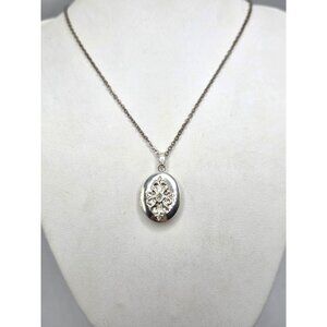 Silver Tone Oval Locket   With Floral Design & Chain